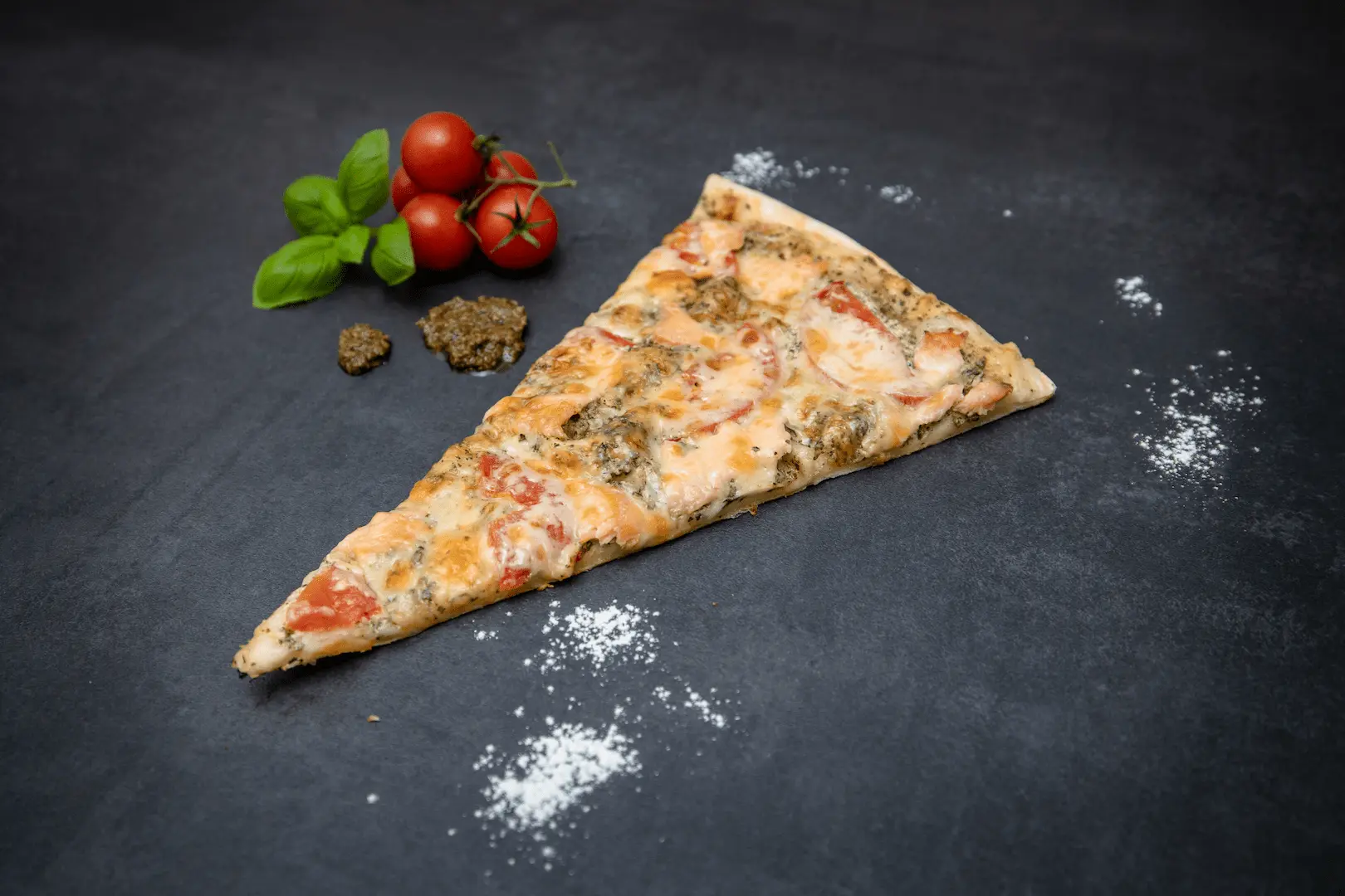 Pizza Catering Brandenburg - eine Stück frischer Pizza aus unserem Foodtruck.