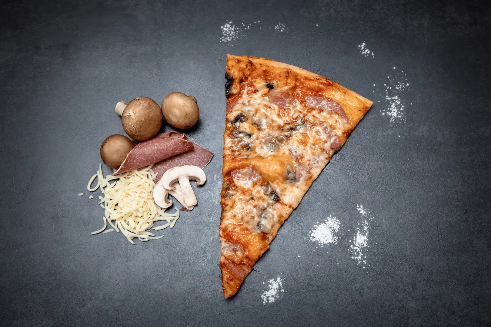 Pizza Catering Brandenburg - eine Stück frischer Pizza aus unserem Foodtruck.